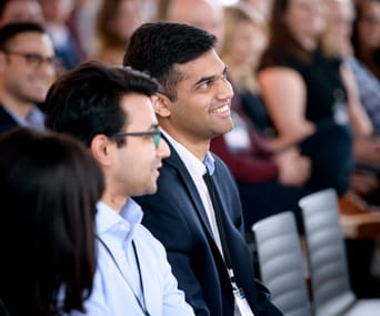 smiling audience members